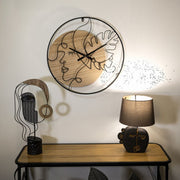 Horloge murale 60 cm visage de profil Ponoma Bois et Noir